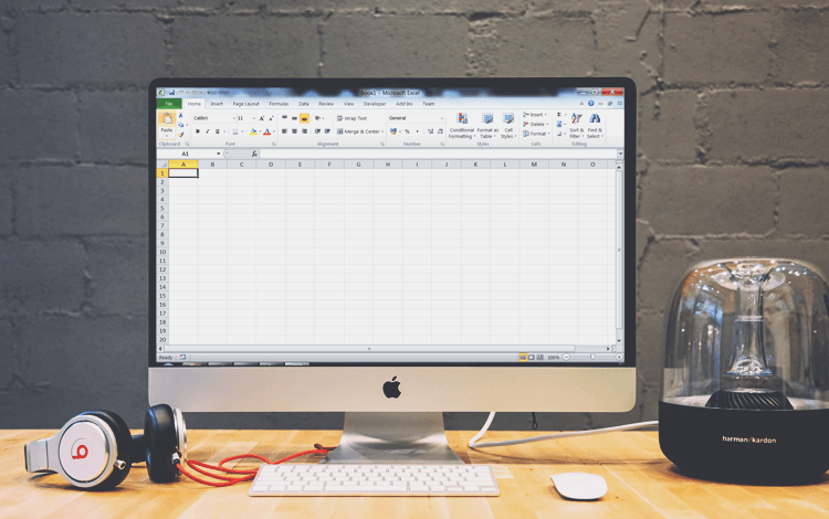 excel sheet on the screen of a monitor