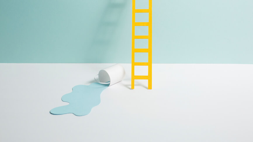 paper ladder and a bucket