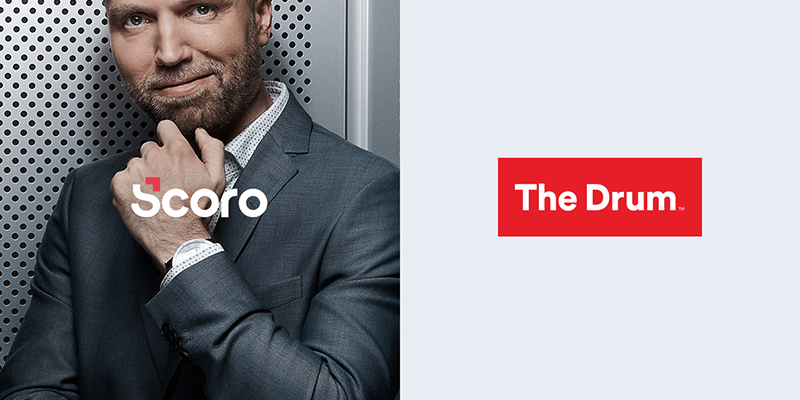 Scoro x The Drum logo