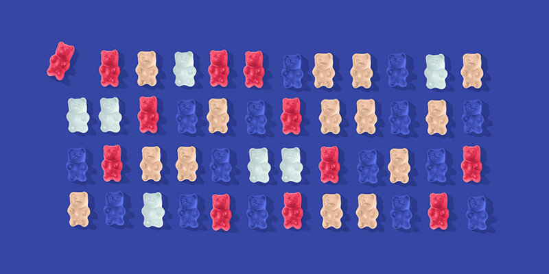 Gummy bears on a blue background